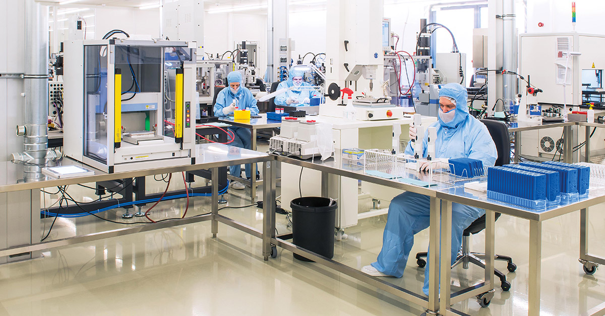 technicians working in clean room