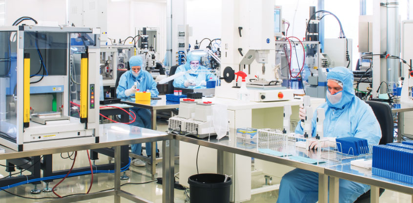 technicians working in a clean room