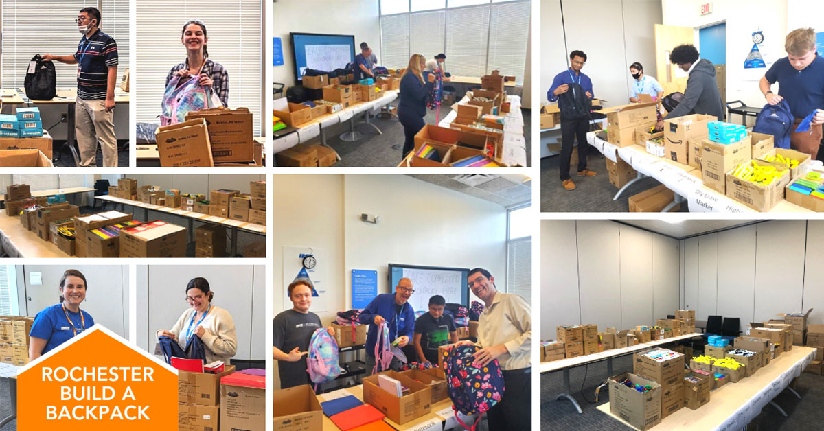 Life Science Optics employees fill backpacks with school supplies