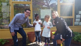 2 IDEX Health & Science volunteers with RCN youth